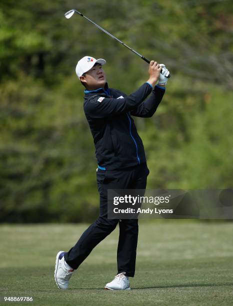 Sungjae Im of South Korea hits his second shot on the 13th hole during the first round of the North Mississippi Classic at the Country Club of Oxford...