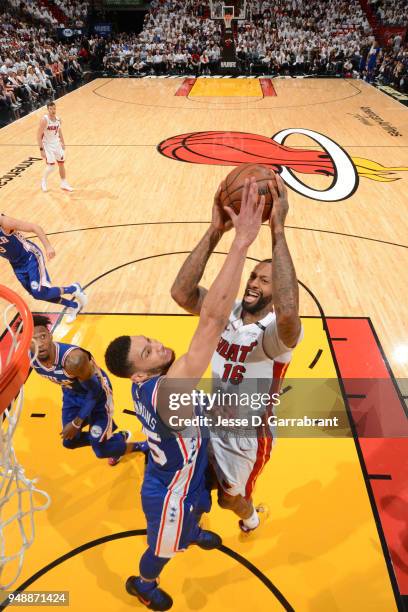 James Johnson of the Miami Heat goes to the basket against the Philadelphia 76ers in Game Three of Round One of the 2018 NBA Playoffs on April 19,...