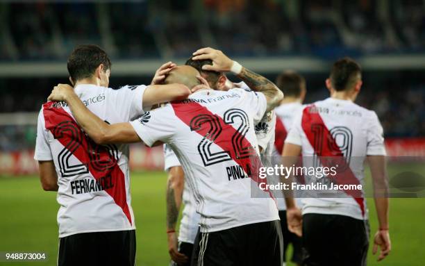 Javier Pinola of River Plate celebrates with teammates after scoring the first goal of his team during a match between Emelec and River Plate as part...