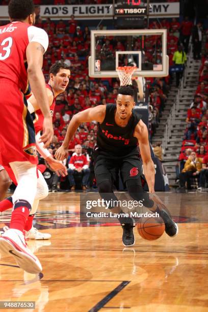 McCollum of the Portland Trail Blazers handles the ball against the New Orleans Pelicans in Game Three of Round One of the 2018 NBA Playoffs on April...