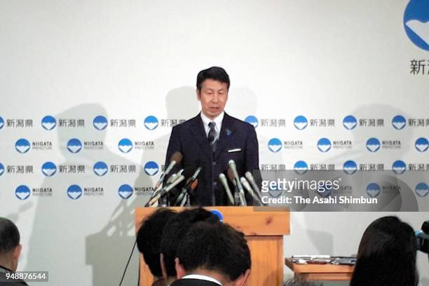 Niigata Prefecture Governor Ryuichi Yoneyama speaks during a press conference on his resignation at the Niigata Prefecture Headquaters on April 18,...