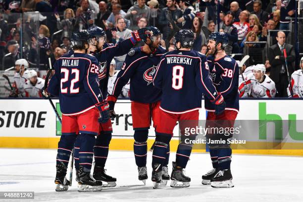 Josh Anderson of the Columbus Blue Jackets celebrates his third period goal with his teammates in Game Four of the Eastern Conference First Round...