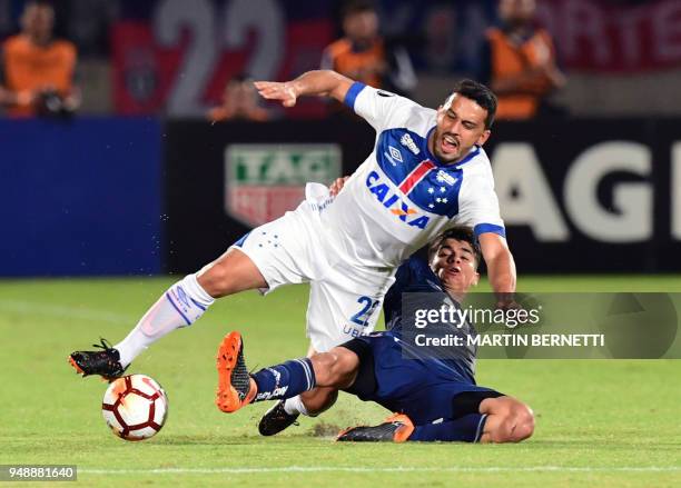 Chile's Universidad de Chile player Lorenzo Reyes vies for the ball with Brazil's Cruzeiro footballer Edilson, during their 2018 Copa Libertadores...