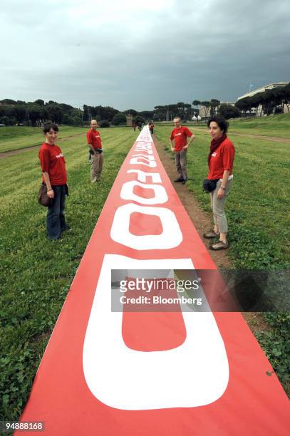 ActionAid demonstrators stage a protest in the Circus Maximus outside the World Food Security conference held by the Food and Agriculture...