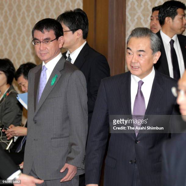 Chinese Foreign Minister Wang Yi and Japanese Foreign Minister Taro Kono attend the China-Japan High Level Economic Talks on April 16, 2018 in Tokyo,...