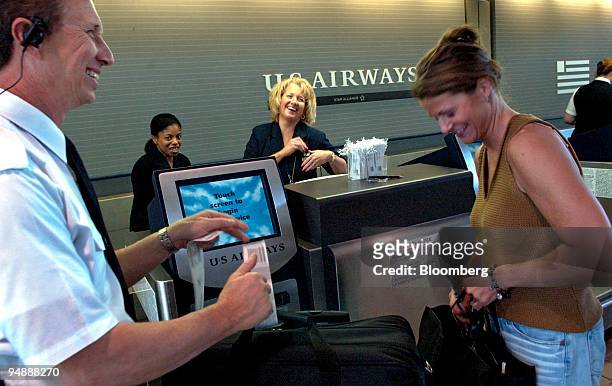Airways employees David Trecki, left, Soraya Johnson, second from left, and Linda Nestor, second from right, share a laugh with Paula Scheller of...