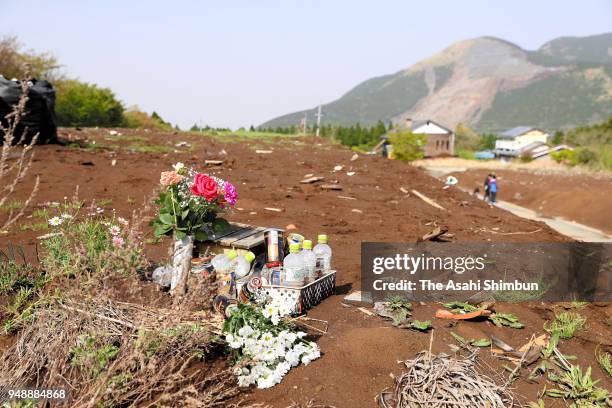 Flowers are offered at the Takanodai area which was hit by series of strong earthquakes on April 16, 2018 in Minamiaso, Kumamoto, Japan. The final...