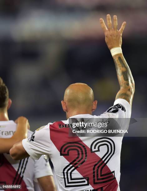 Argentina's River Plate player Javier Pinola celebrates his goal against Ecuador's Emelec, during their Copa Libertadores football match at George...