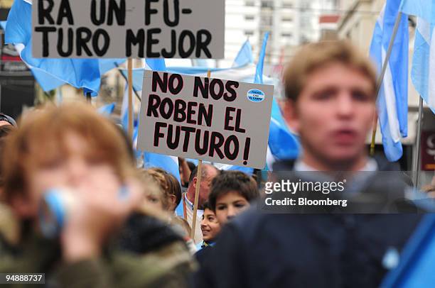 Kids carry a banner that reads "Don't steal our future" during a rally in support of striking farmers in Pergamino, Argentina, on Monday, June 2,...