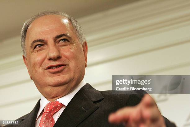 Iraqi Deputy Prime Minister Ahmad Chalabi gestures to the gathered crowd at the American Enterprise Institute in Washington D.C. November 9, 2005.