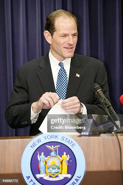 State Attorney General Eliot Spitzer speaks at a September 15 news conference to announce the indictment of eight former Marsh Inc. Managers for bid...