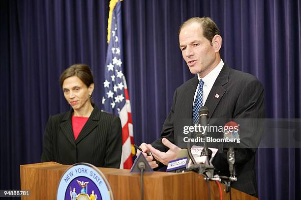 State Attorney General Eliot Spitzer and Janet Cohn, Criminal Prosecutions Bureau Chief appear at a September 15 news conference to announce the...