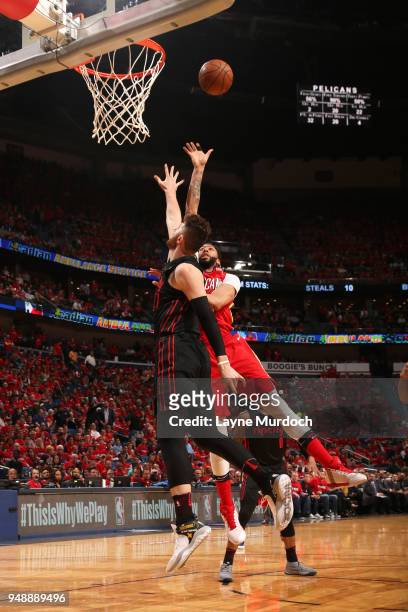 Anthony Davis of the New Orleans Pelicans shoots the ball over Jusuf Nurkic of the Portland Trail Blazers in Game Three of Round One of the 2018 NBA...