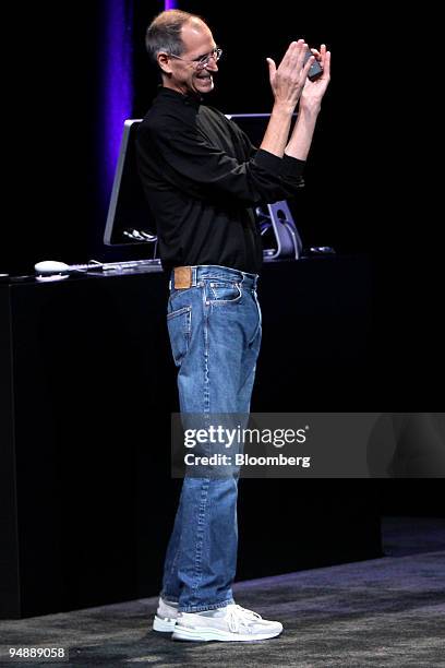 Steve Jobs, chief executive officer and co-founder of Apple Inc., applauding at the end of the event entitled "Let's Rock" at the Yerba Buena Center...