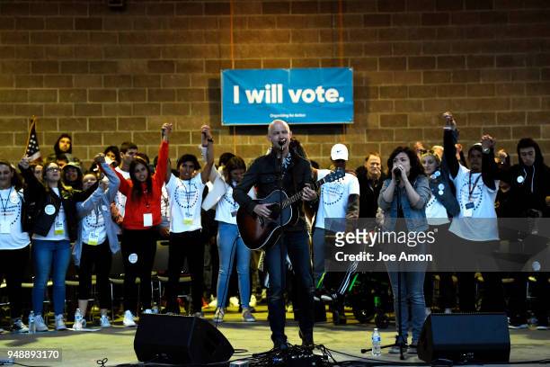Issac Slade of the Fray with his wife, Anna perform "How to Save a Life" with students from Marjory Stoneman Douglas High School, Pittsburg,...