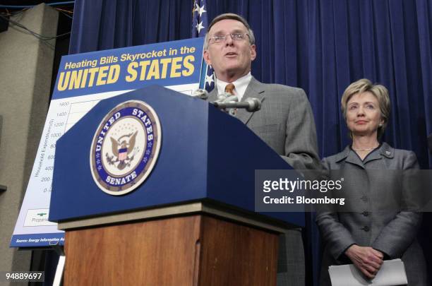 Sen. Byron Dorgan speaks Tuesday, Nov. 8 in Washington, D.C. As Sen. Hillary Rodham Clinton listens at a news conference on high energy prices and...