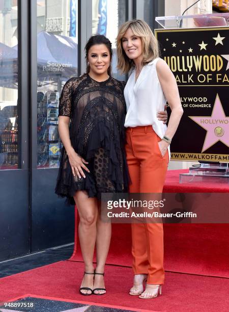 Actors Eva Longoria and Felicity Huffman attend the ceremony honoring Eva Longoria with star on the Hollywood Walk of Fame on April 16, 2018 in...
