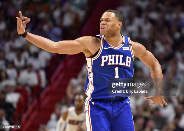 Justin Anderson of the Philadelphia 76ers reacts after hitting a three pointer in the third quarter of the game against the Miami Heat at American...
