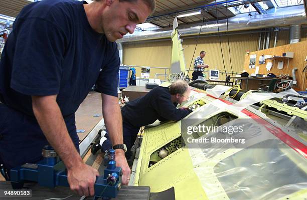 The fuselage under construction on a jet fighter under construction at the Saab Jas Gripen factory in Linkoeping, Sweden, Tuesday, February 10, 2004....