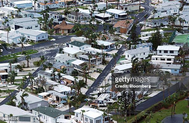 Damaged trailer homes can be seen near Fort Pierce, Florida, Monday, September 6, 2004 after Hurricane Frances moved through the area.