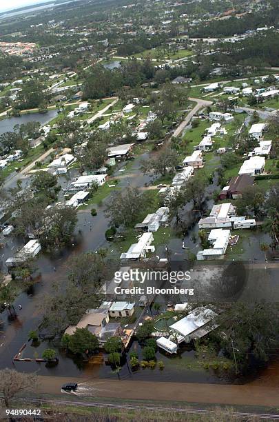 Truck is shown in a flooded out area of trailer homes near Fort Pierce, Florida, Monday, September 6, 2004.