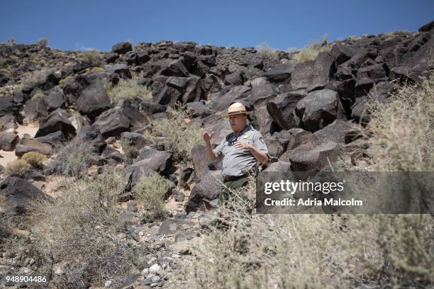 Park Ranger Superintendent Dennis A. Vasquez guides a tour at Petroglyph National Monument on April 19, 2018 in Albuquerque, New Mexico.