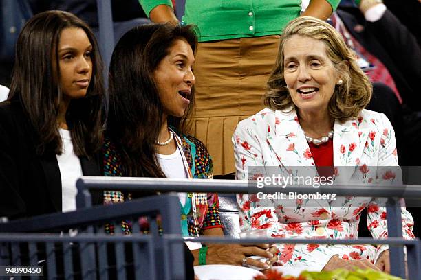 Jane Brown Grimes, president of the United States Tennis Association, right, speaks to Jeanne Moutoussamy Ashe, wife of the late former tennis player...