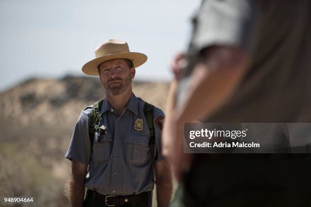 Park Ranger Chief Ranger Dale Kissner guides a tour at Petroglyph National Monument on April 19, 2018 in Albuquerque, New Mexico.