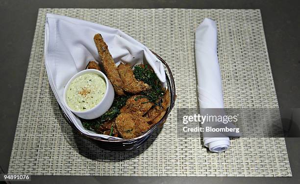 Crispy Rabbit appetizer is displayed for a photograph at Mia Dona in New York, U.S., on Monday, Feb. 25, 2008. The new restaurant is on 58th Street...