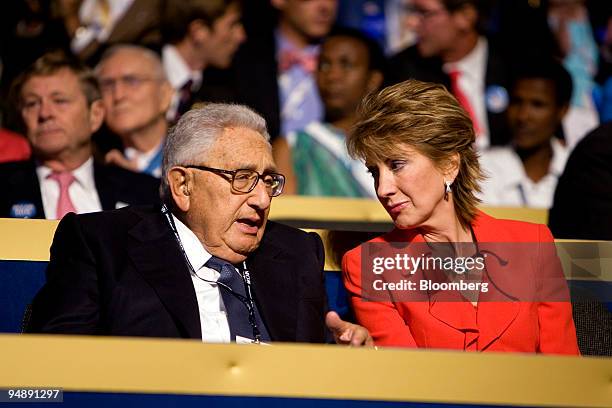 Henry Kissinger, former U.S. Secretary of state, left, speaks to Carly Fiorina, chairman of the Republican National Committee Victory 2008 and former...