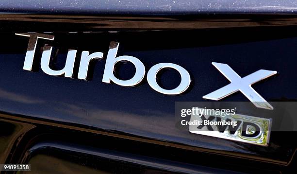 The badges for the Saab Turbo X are photographed on the car in East Burke, Vermont, U.S., on Saturday, May 24, 2008. The limited-edition car features...