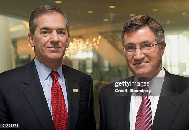 Gary Forsee, left, president and CEO, Sprint Nextel Corp., and Glenn Britt, chairman and CEO, Time Warner Cable Inc., pose in New York, Wednesday,...