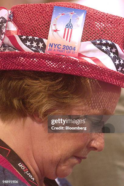 Ohio alternate delegate Mary Jo Hawkins bows her head during the invocation at the Republican National Convention in New York, September 1, 2004.