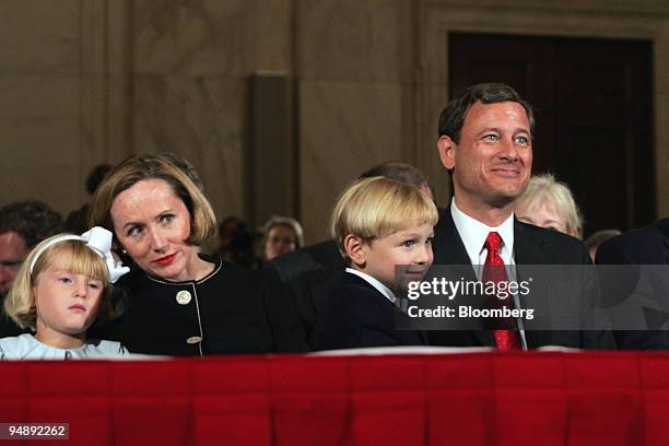 Supreme Court Chief Justice nominee John Roberts sits with his wife, Jane Roberts and their children, Jack and Josephine Roberts during his...