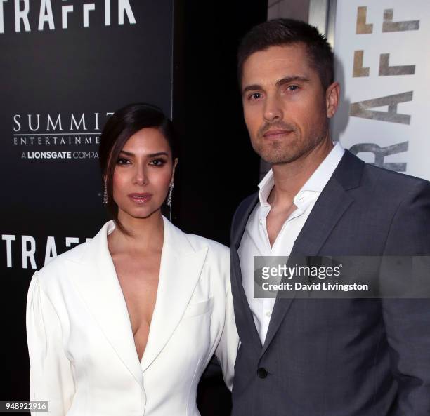 Actors Roselyn Sanchez and Eric Winter attend the premiere of Codeblack Films' "Traffik" at ArcLight Hollywood on April 19, 2018 in Hollywood,...