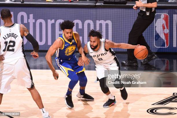 Patty Mills of the San Antonio Spurs handles the ball against the Golden State Warriors in Game Three of Round One of the 2018 NBA Playoffs on April...