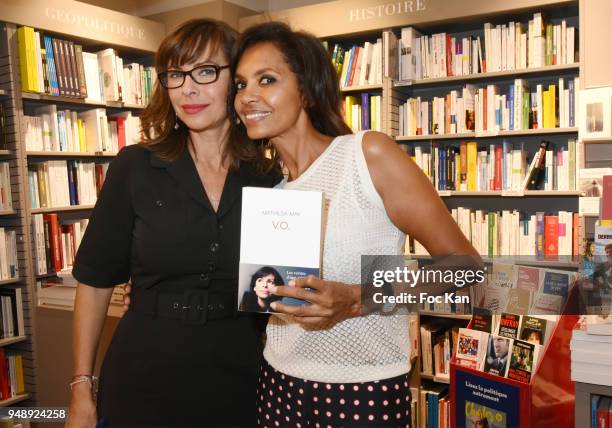 Mathilda May and TV presenter Karine Le Marchand attend "V.O." Mathilda May Book Signing at Librairie Albin Michel Bd Saint Germain on April 19, 2018...