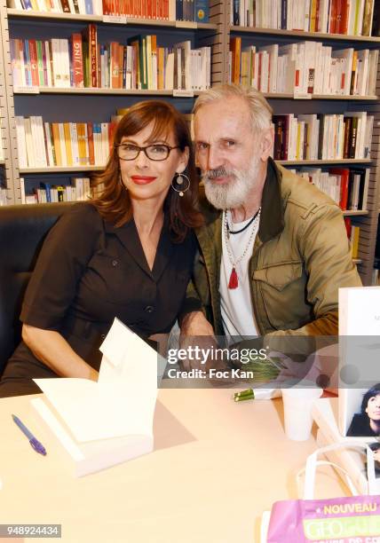 Actress Mathilda May and photographer Jean Marie Marion attend "V.O." Mathilda May Book Signing at Librairie Albin Michel Bd Saint Germain on April...