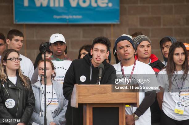 Carlitos Rodriguez, a student at Marjory Stoneman Douglas High School, speaks during the Vote For Our Lives rally and vigil at Columbine High School...