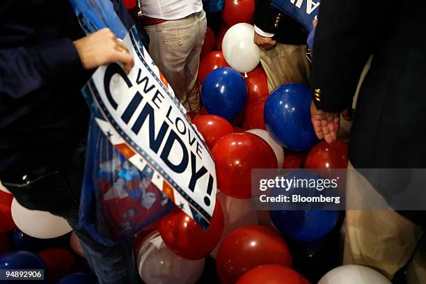 Delegate holds a sign in support of Cindy McCain, wife of Senator John McCain of Arizona, Republican presidential candidate, at the end of day four...