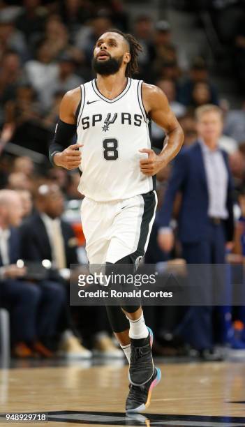 Patty Mills of the San Antonio Spurs runs back after committing a turnover against the Golden State Warriors at AT&T Center on April 19 , 2018 in San...