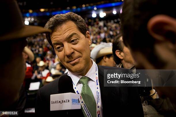 Sam Brownback, a Republican senator from Kansas, speaks to an interviewer on day four of the Republican National Convention at the Xcel Energy Center...