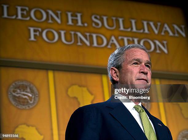 President George W. Bush pauses during remarks at a meeting of the Leon H. Sullivan Foundation in Washington, D.C., U.S., on Tuesday, Feb. 26, 2008....