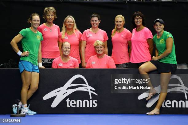 Samantha Stosur and Ashleigh Barty of Australia pose for a photo with fans during a training session ahead of the World Group Play-Off Fed Cup tie...