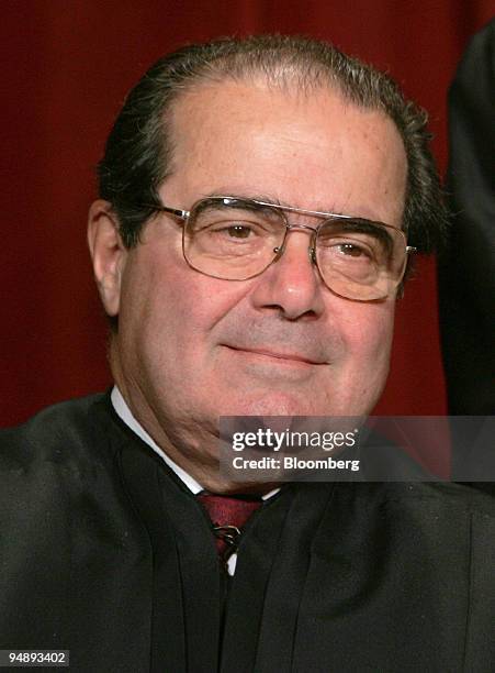 Supreme Court Chief Justice Antonin Scalia poses for the official photograph at the Supreme Court in Washington D.C. On October 31, 2005.