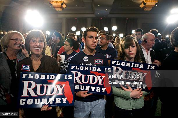 Supporters of Rudy Giuliani, former mayor of New York City and 2008 Republican presidential candidate, await his arrival at a primary night rally in...