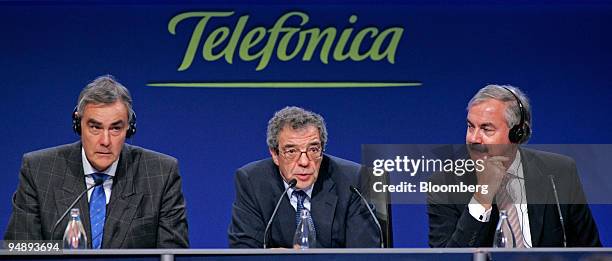 Chairman David Arculus, left, Telefonica Chairman Cesar Alierta, center, and O2 Chief Executive Peter Erskine speak at a news conference in Madrid,...