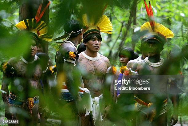 Members of the Xingu Indian tribe dance during a ritual in the Amazon forest of Brazil, on March 28, 2006. Lawmakers are debating a bill to allow...