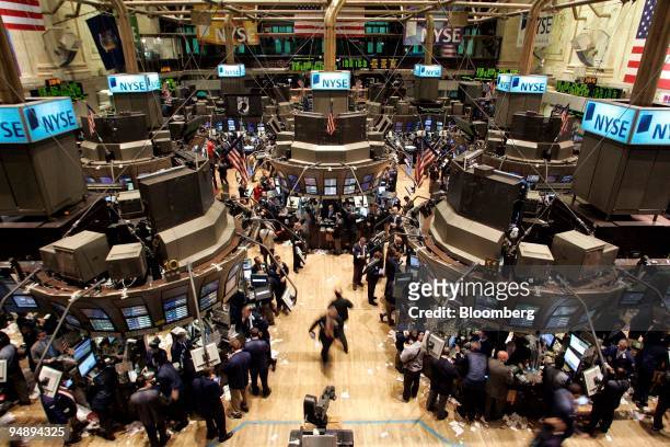 Traders and Specialists work the trading floor of the New York Stock Exchange before the Closing Bell on Friday, October 28, 2005 in New York. U.S....