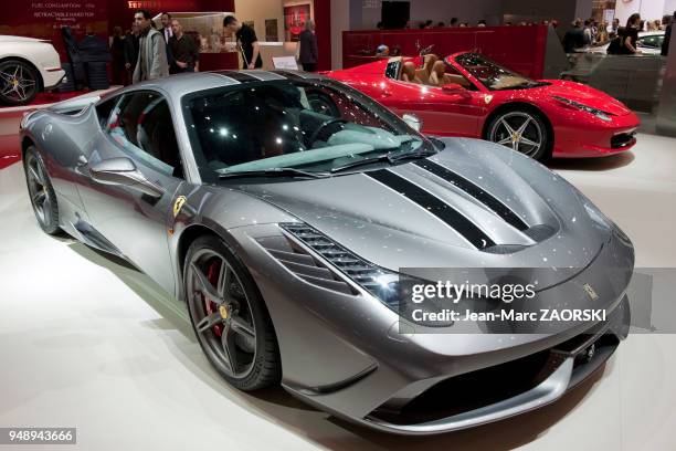 La Ferrari 458 speciale au premier plan et la Ferrari 458 Spider au fond, exposees sur le stand Ferrari au 84eme salon international de l'automobile...